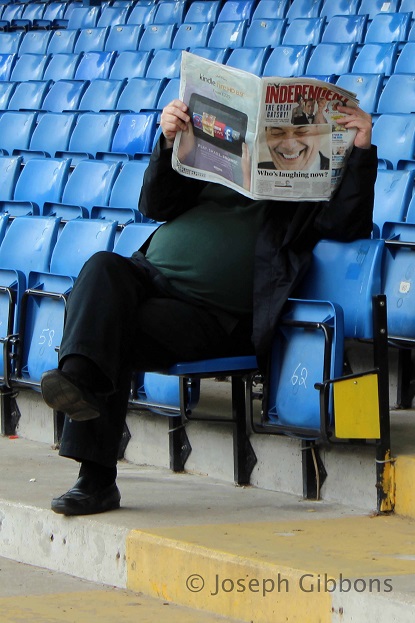 Reading the newspaper