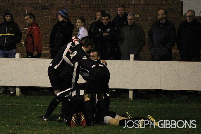 Celebrating in front of Gary Mills