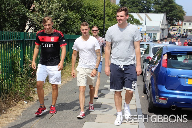 The Colls lads walking back to the ground