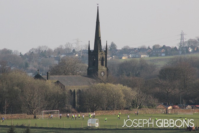 Old Boltonians in action against Breightmet
