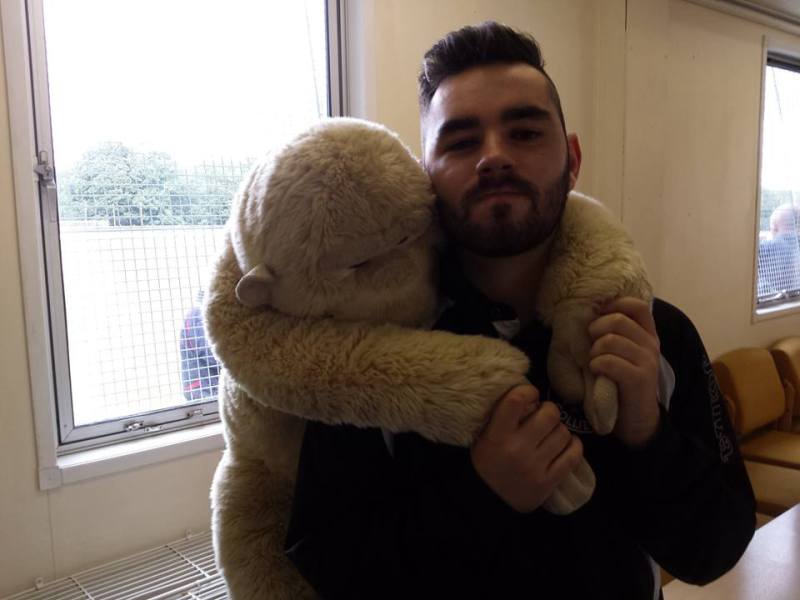 Post match cuddles with a monkey